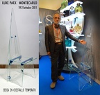 LUXE PACK - Monaco - espositori di acciaio a forma di ANGELO con piani in cristallo illuminazione Led, progettati e realizzati da Beniamino Antonello